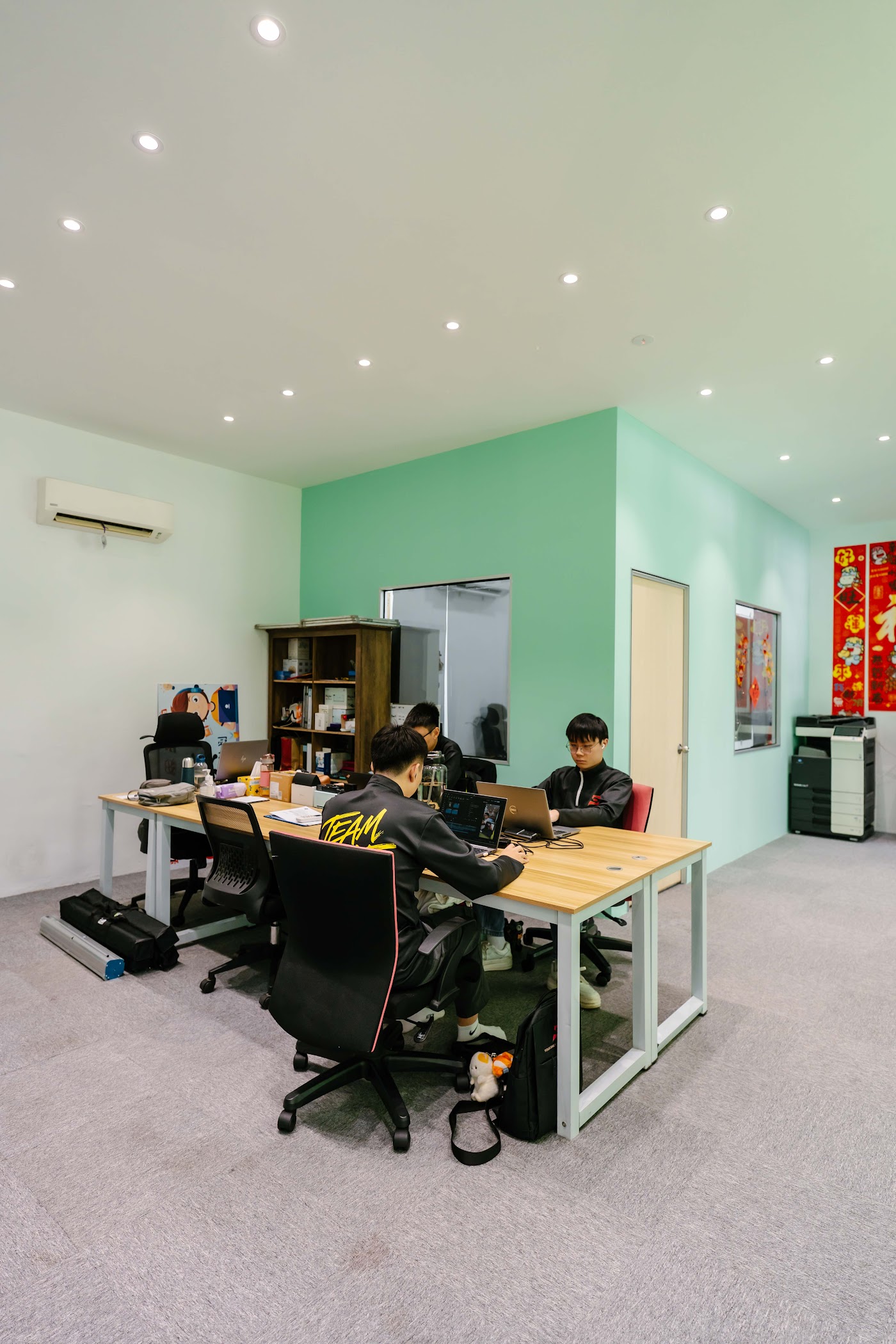 SCE Distributor team working together at open desks in the office