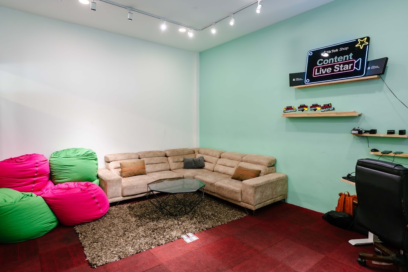 SCE office chill corner with bean bags and a sofa