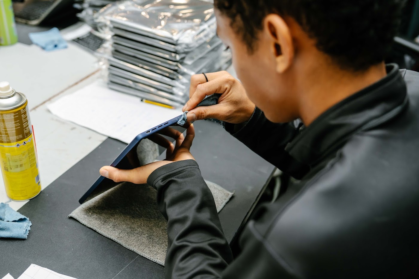 Refurbished laptops undergoing final checks before delivery