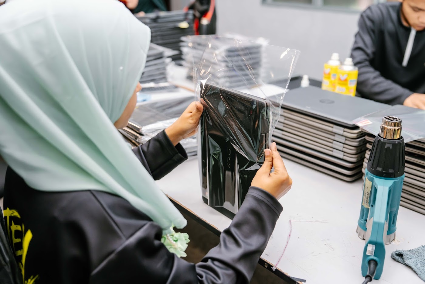 Certified refurbished laptops prepared for a customer order